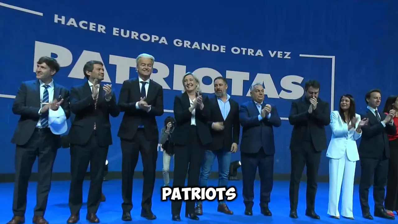 group of politicians on stage applauding under a 'Patriots' banner