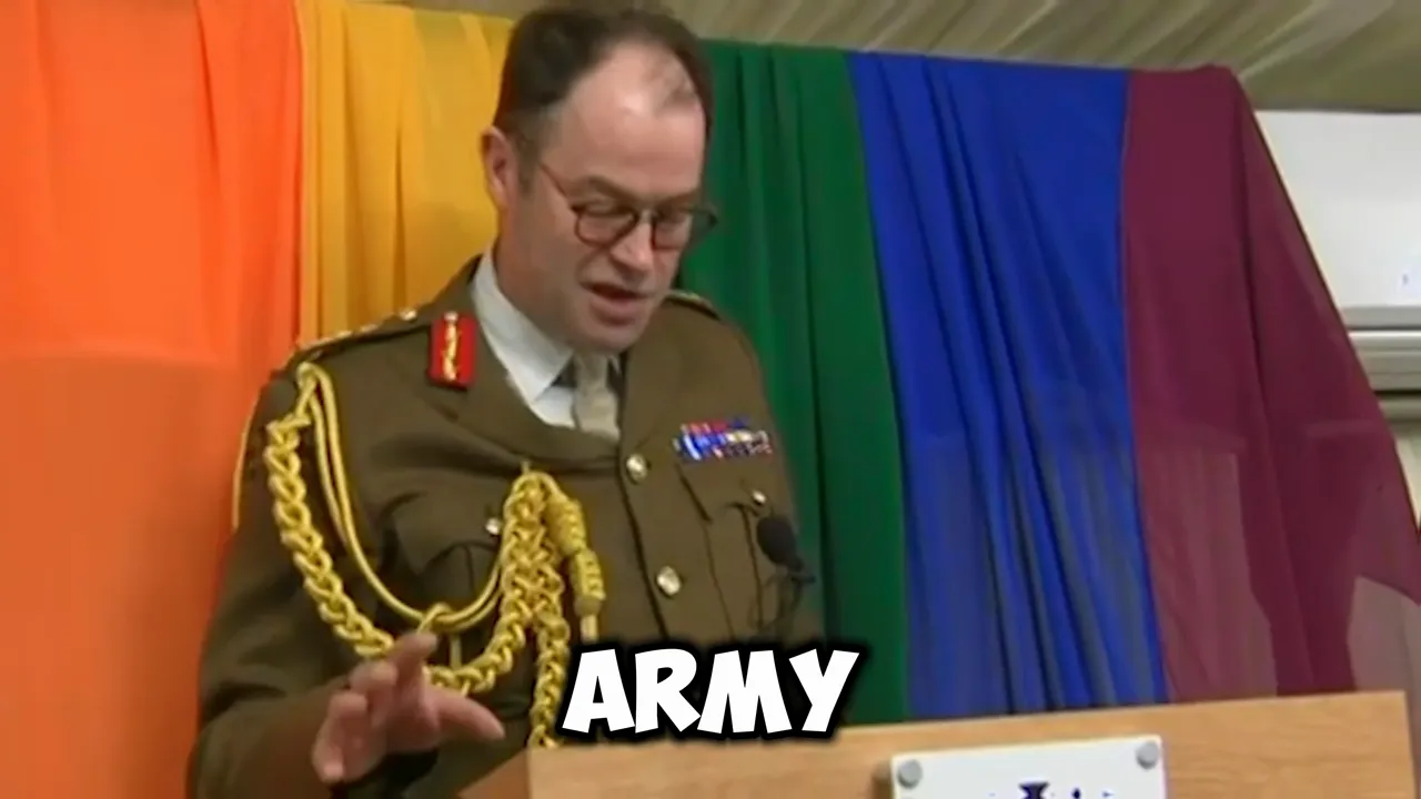 Uniformed army officer speaking at a podium with rainbow-coloured curtains behind and an