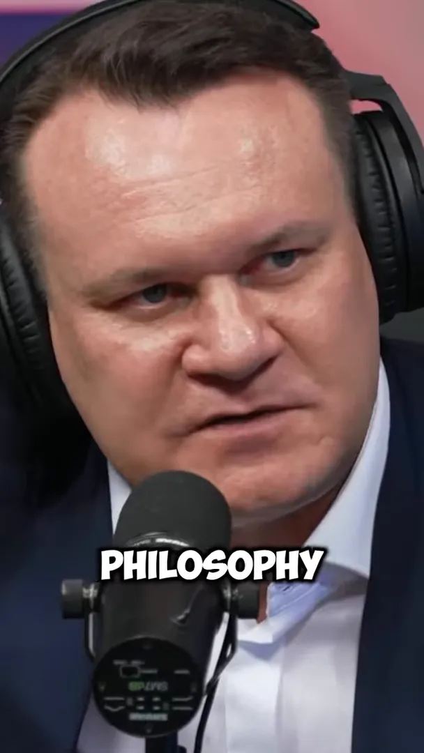 Dominik Tarczyński speaking into a microphone with on-screen text reading “PHILOSOPHY”