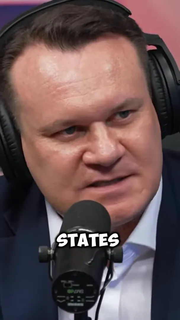Dominik Tarczyński speaking into a studio microphone during a debate about Europe’s identity