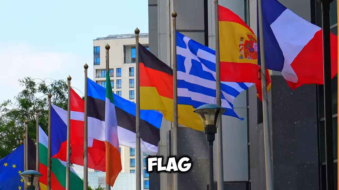 Row of national flags outside a building