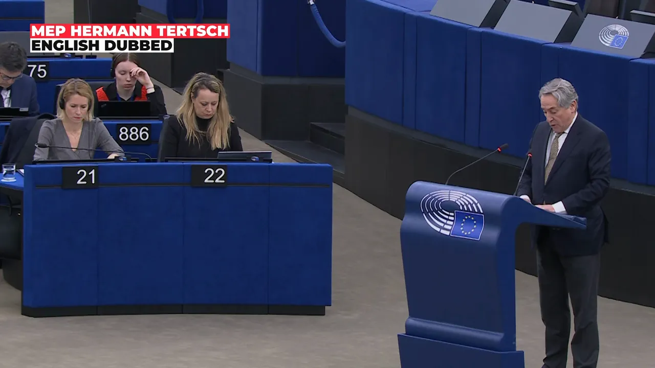 Person speaking at a podium in the European Parliament chamber with nearby delegates and the EU emblem on the lectern.