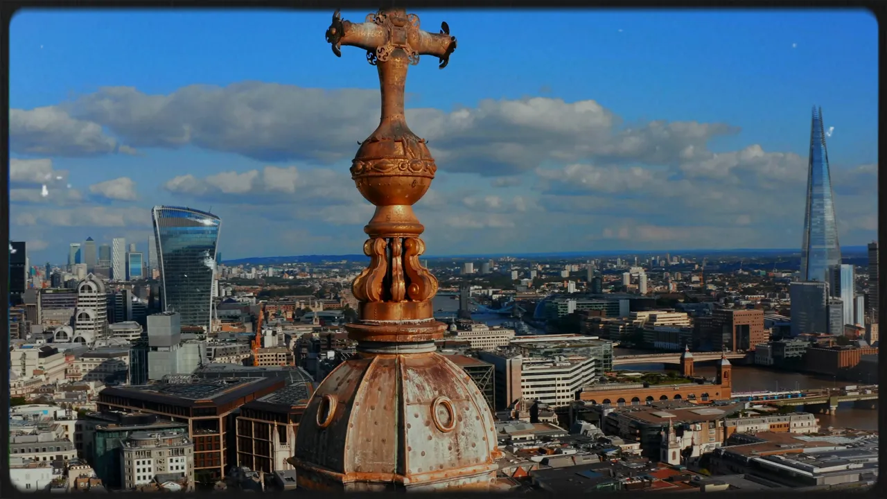 london skyline with historic church finial in foreground