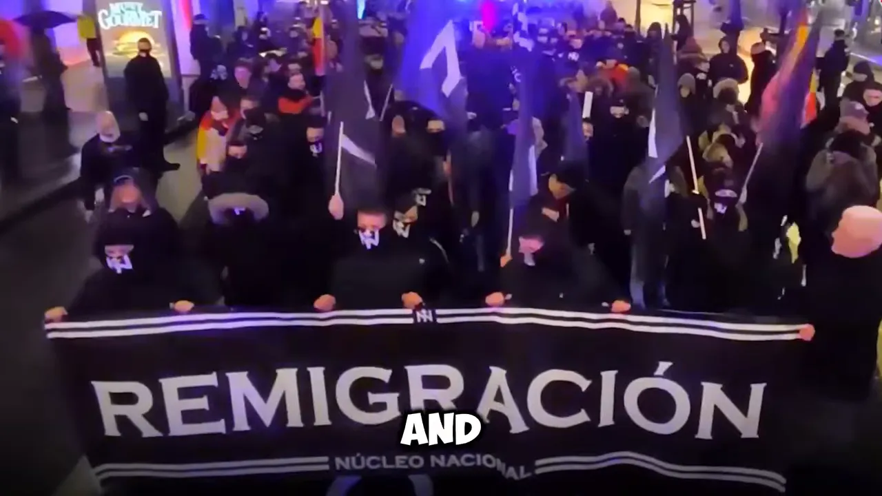Political rally stage with a row of speakers under a large PATRIOTAS banner