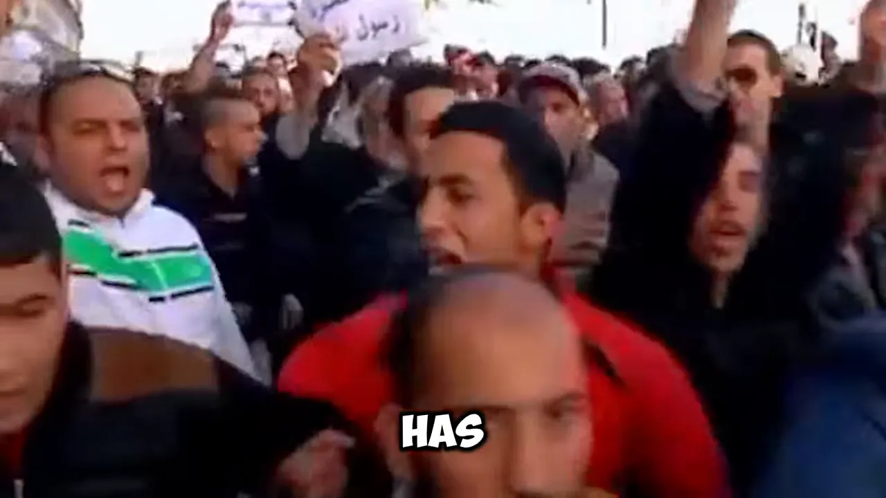 Audience scene with overlay text 'HAS' during a political commentary segment