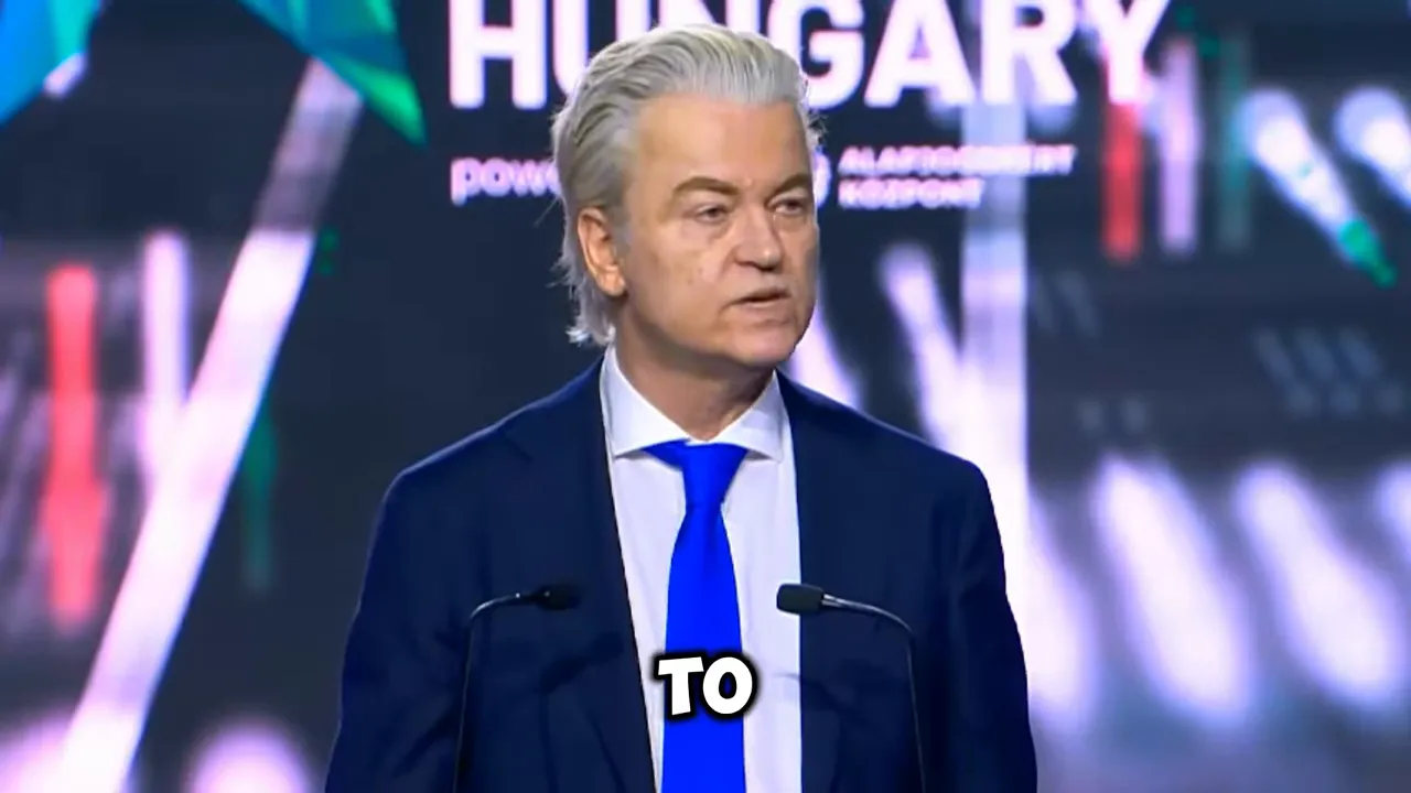Geert Wilders speaking and looking to the side on stage at a political event