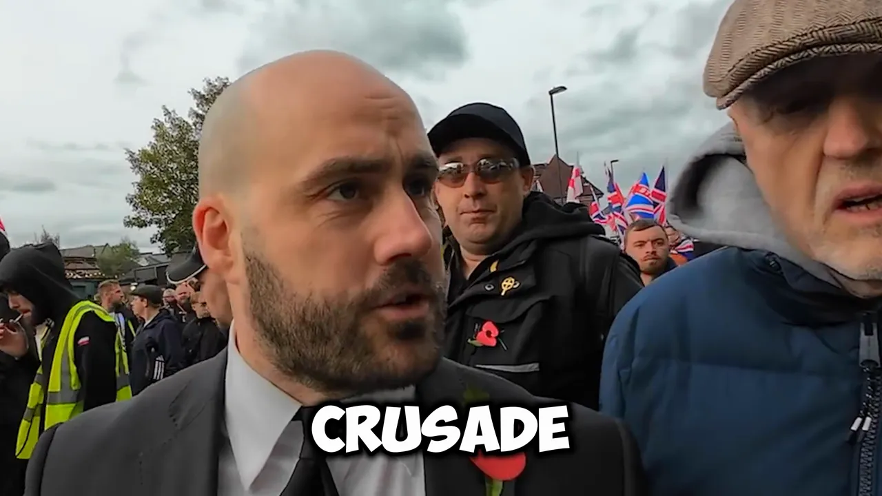 Crowd chanting and banners at a protest