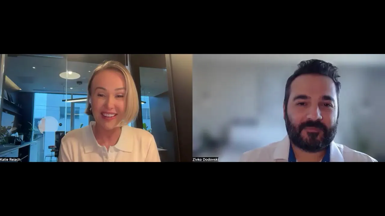 Well-lit split-screen video call with two people smiling and engaging, office background on the left and blurred background on the right.