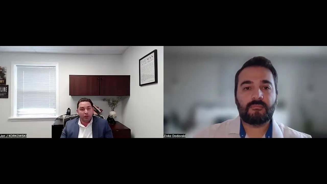 Split-screen video interview with two speakers; both faces clearly visible — left in an office, right against a blurred background.