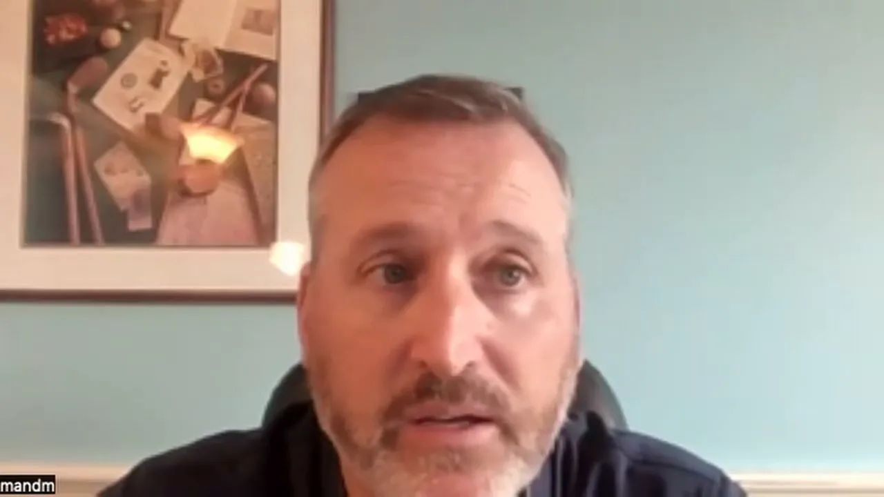 Well-framed video-call screenshot of presenter delivering closing thoughts on payment processing