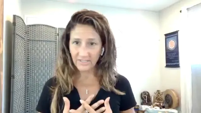 Instructor with hands over the heart, looking at the camera and inviting the viewer to start a gratitude practice