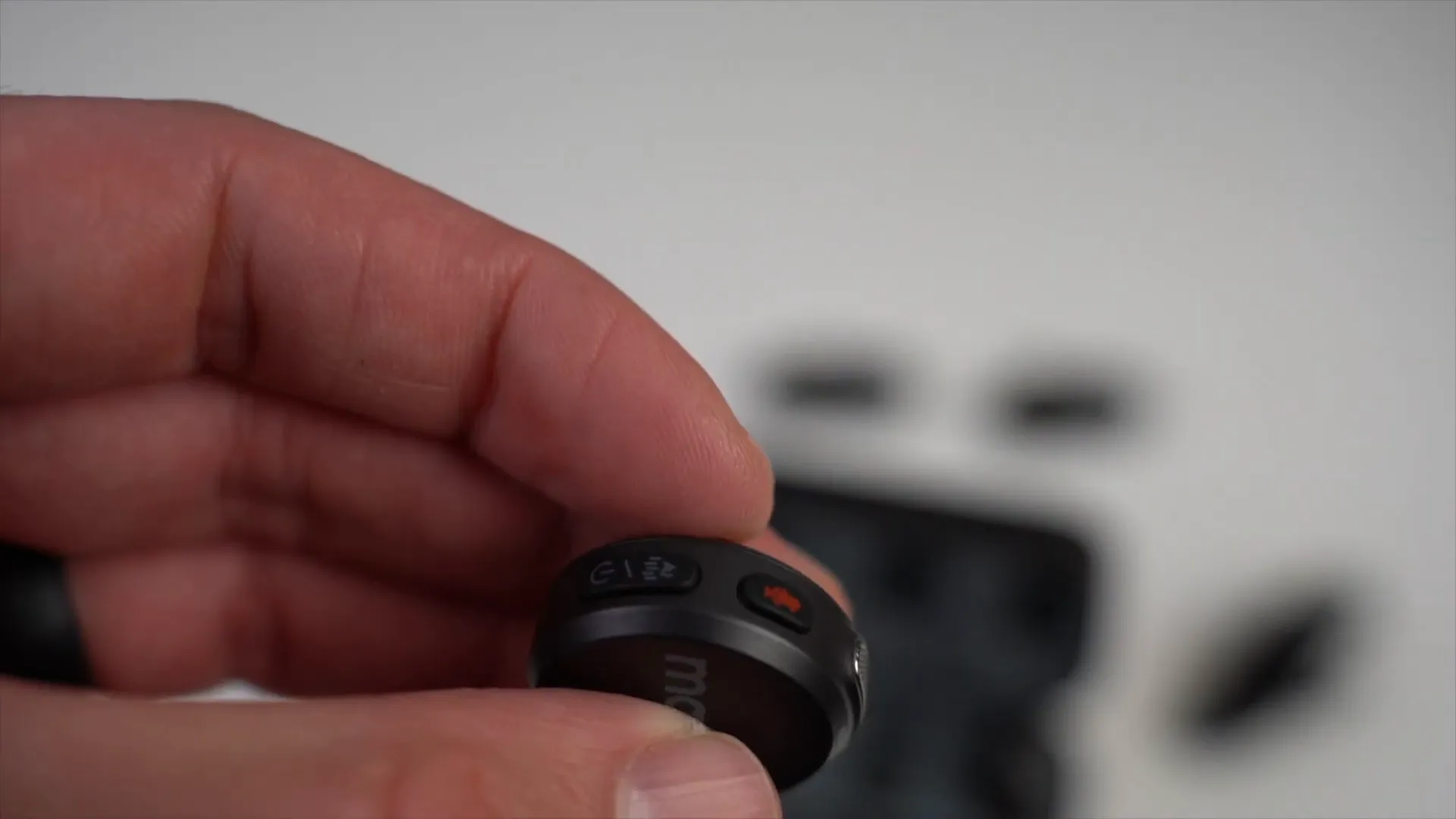 Transmitters with buttons and built-in microphones