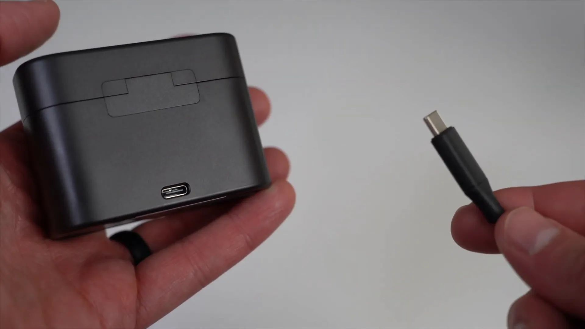 Charging cable connected to the Maono Wave T5 charging case