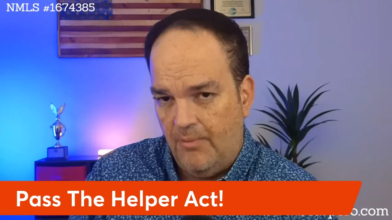 Presenter centered in frame with blue/purple backlighting and a large red lower‑third that says 