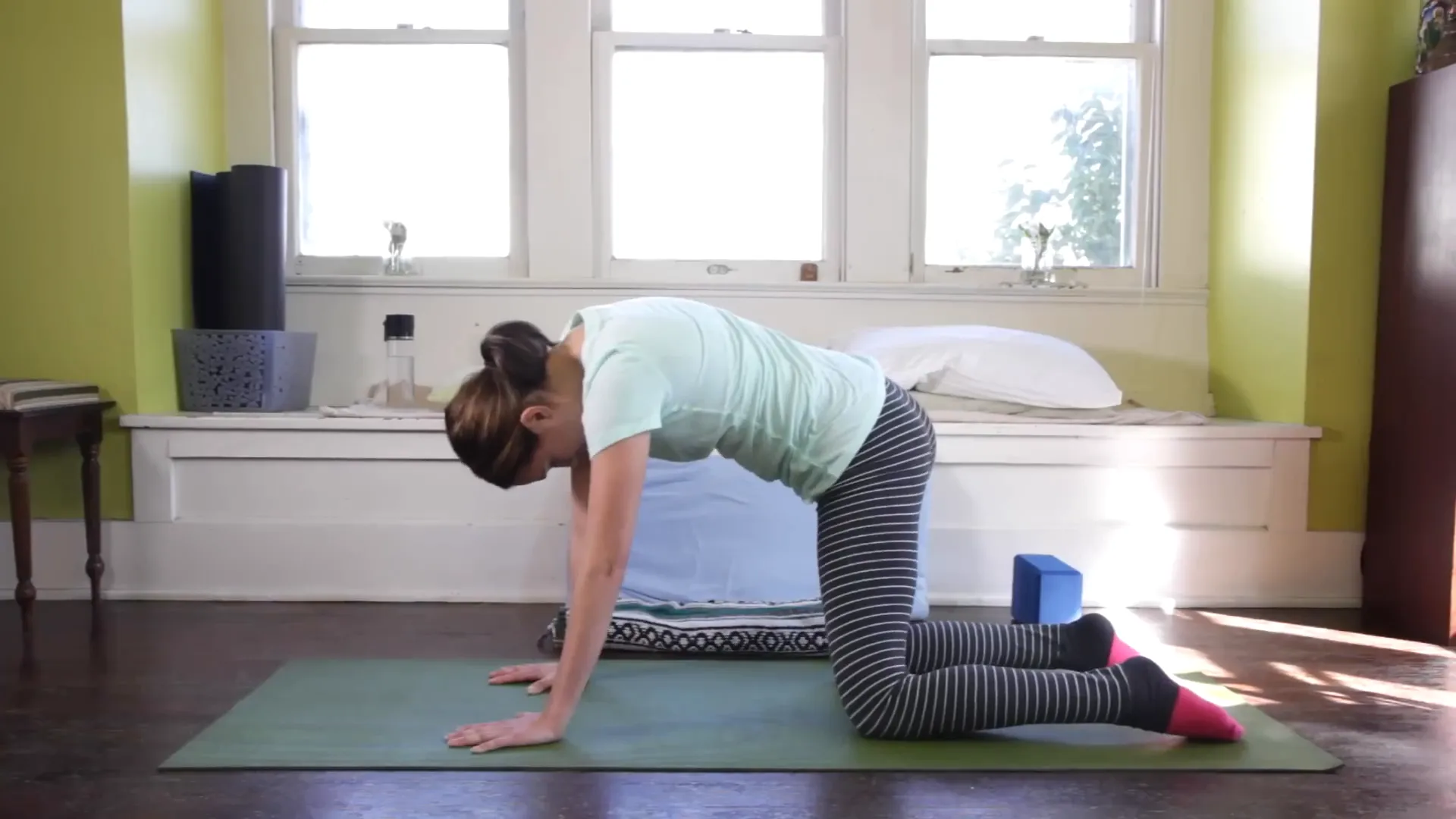 Flowing through Cat-Cow pose in Yoga For Women