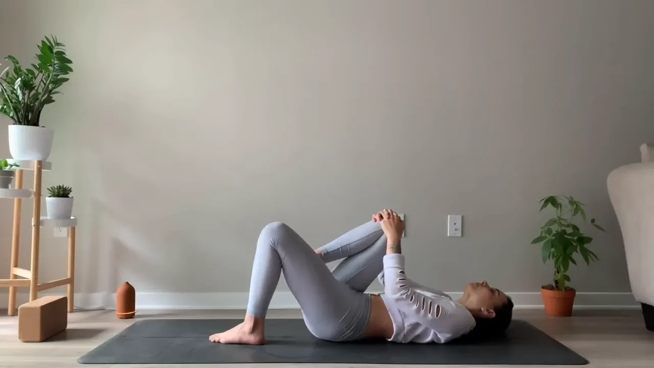 Rolling out right ankle while hugging right knee