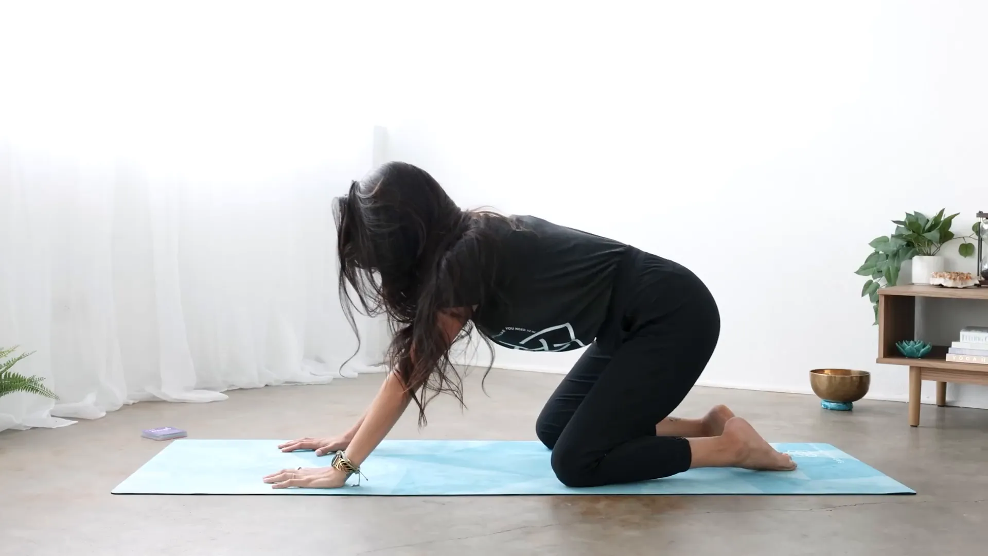 Child's pose with forehead resting on mat