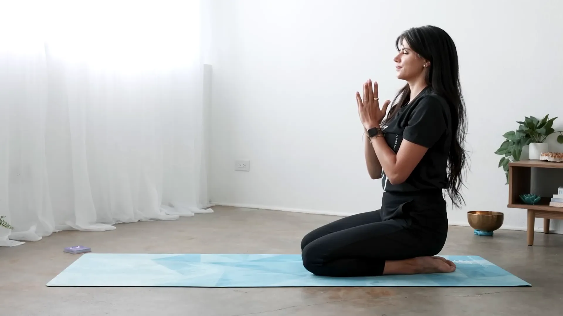 Sealing the practice with hands at heart center