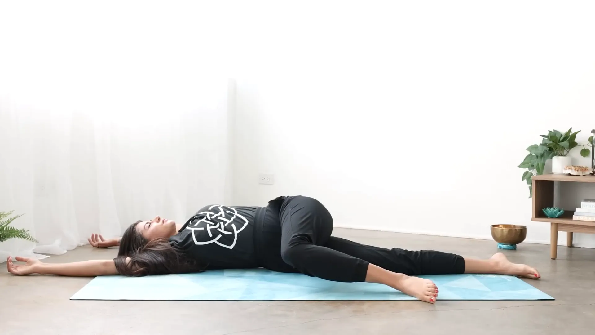 Gentle belly twist with arms overhead
