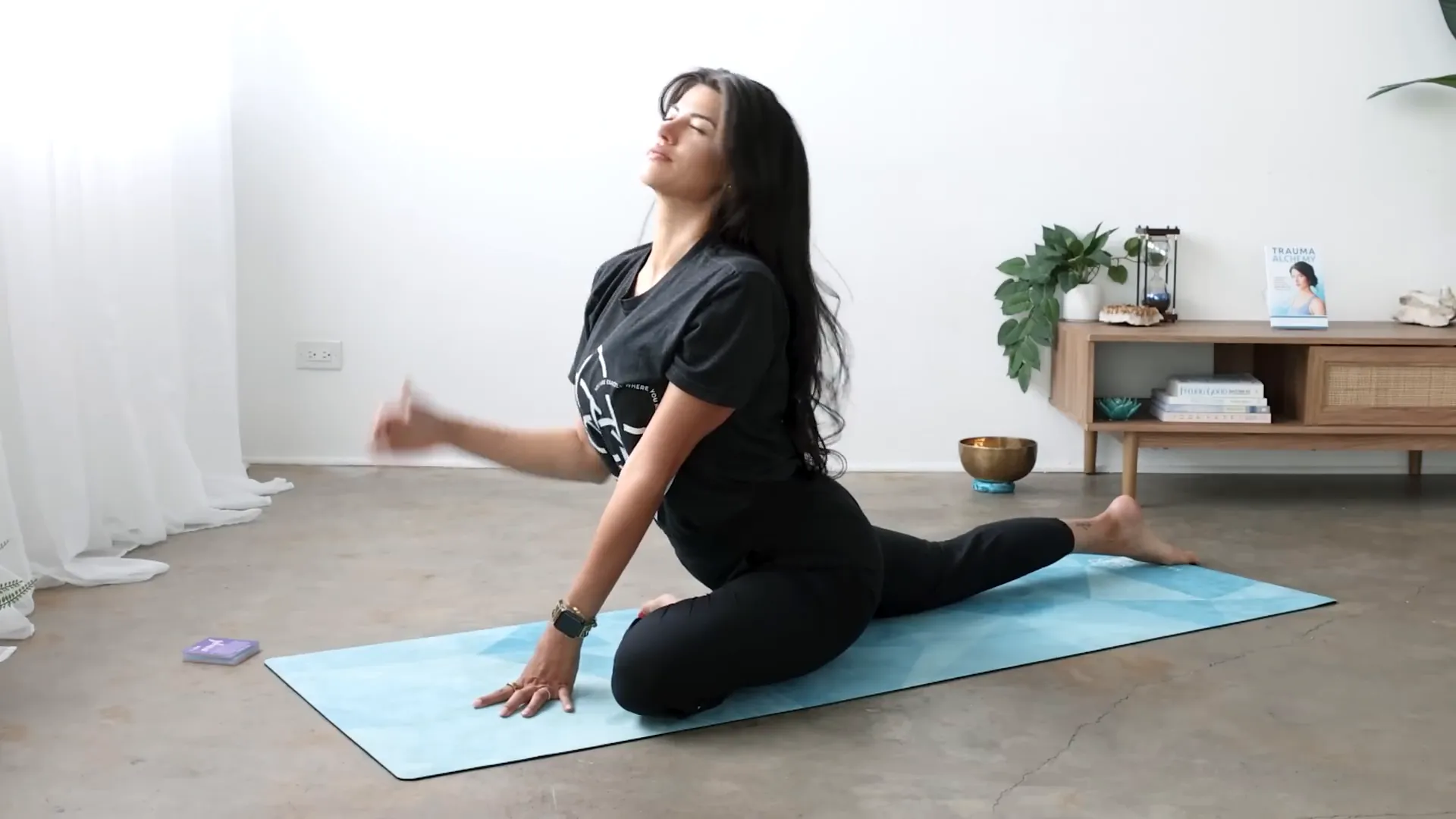 Half pigeon pose with left knee forward