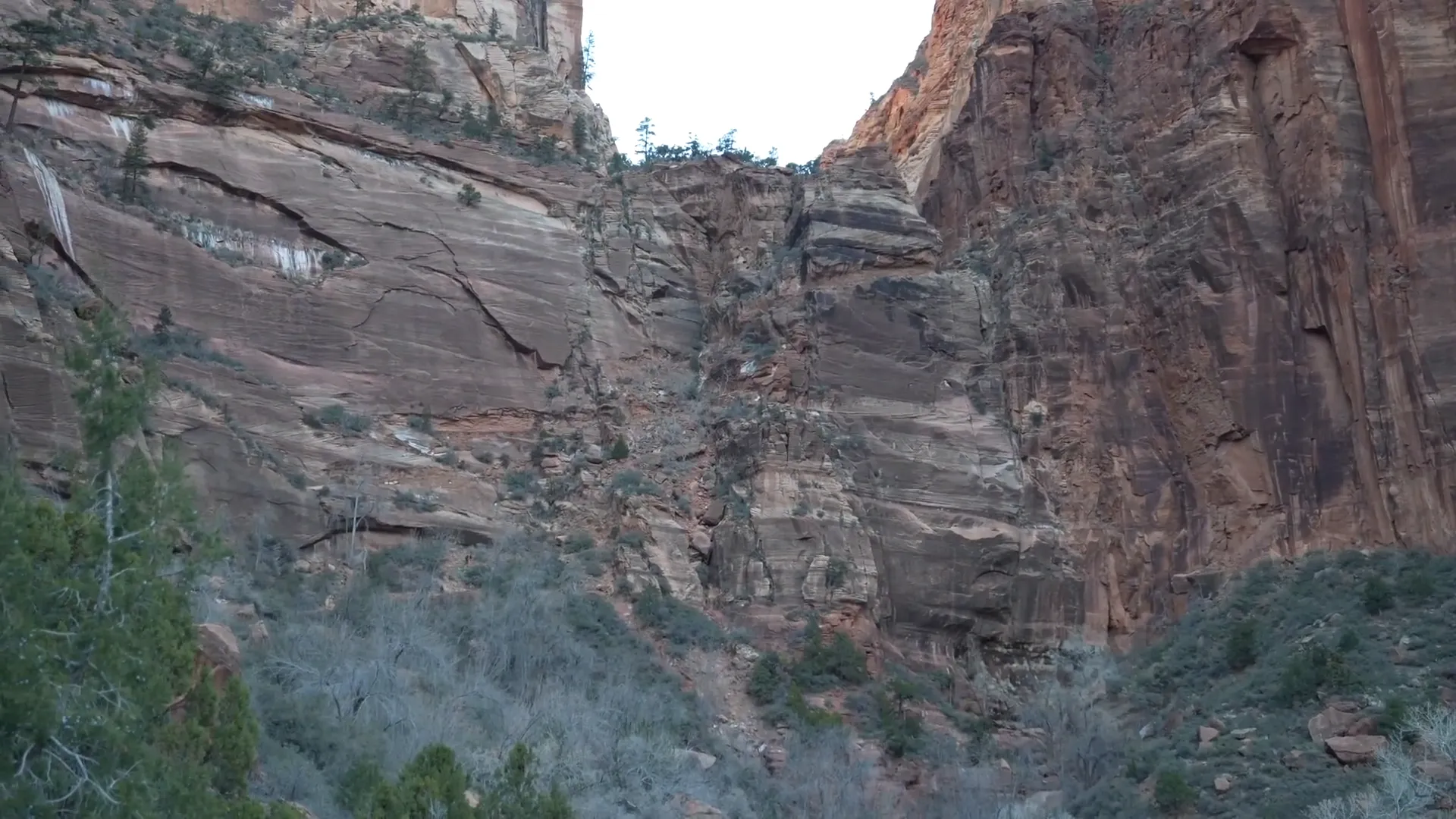 Hikers ascending the first set of switchbacks