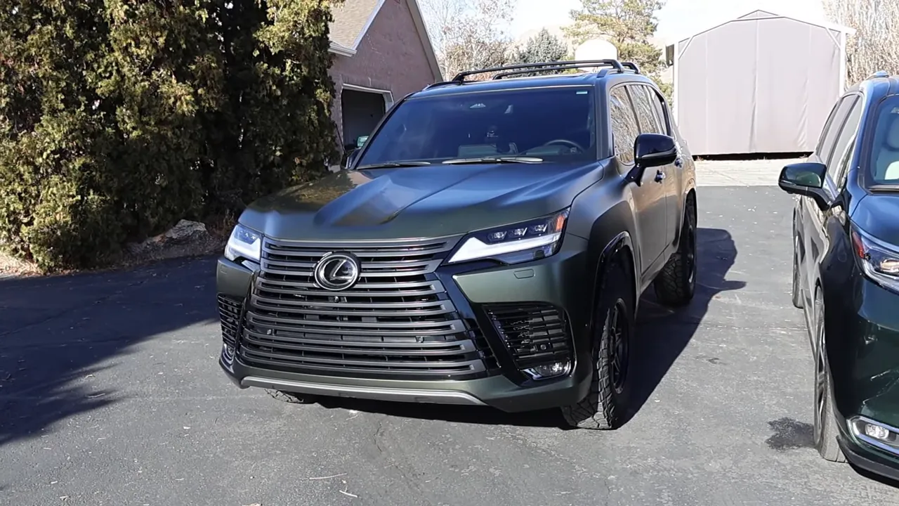 Head-on view of Lexus LX showing huge grille and aggressive front fascia