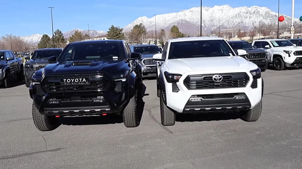 2026 Toyota Tacoma TRD PRO (left) next to TRD Off-Road (right) front view highlighting styling differences