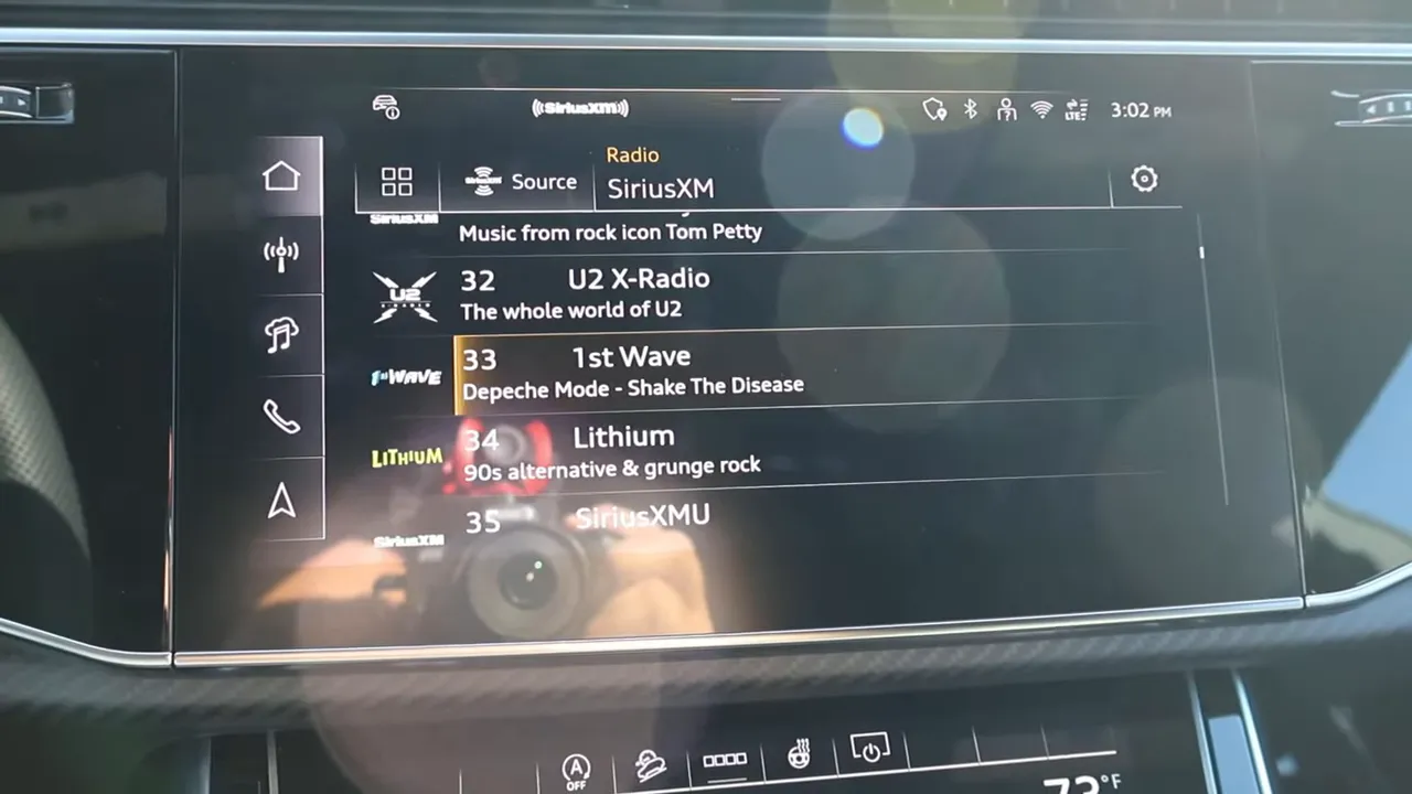 Audi SQ8 main infotainment display showing SiriusXM channels and a shortcut sidebar.