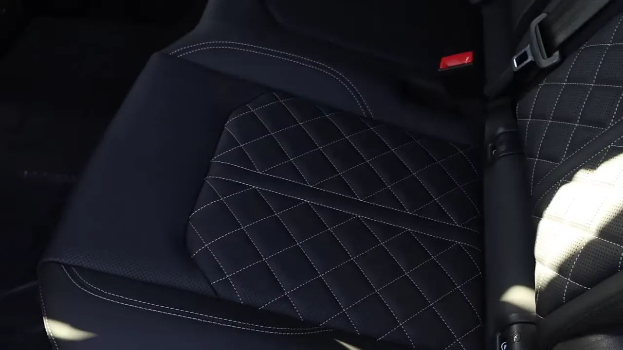 SQ8 rear seat cushion with diamond quilting, perforation and white contrast stitching
