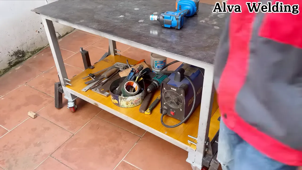 Final inspection of the reinforced bench showing straight edges and painted finish