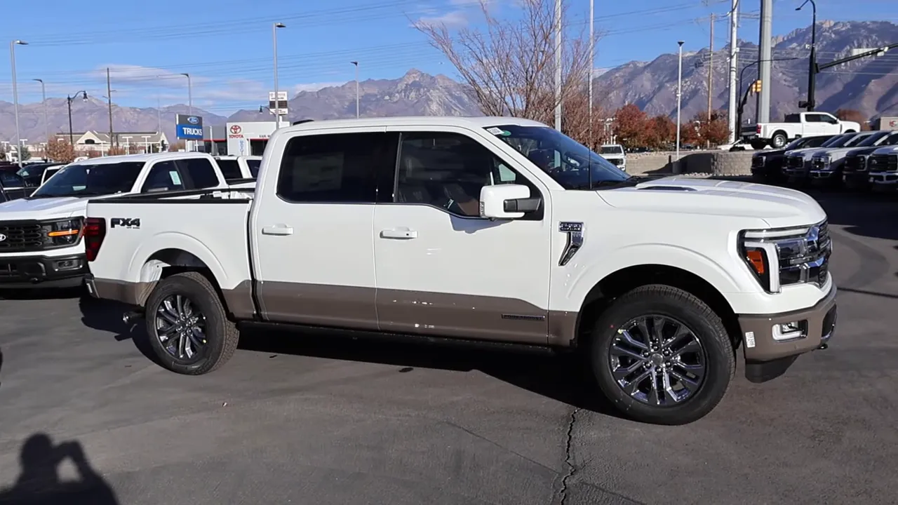 Side profile of 2026 Ford F-150 King Ranch showing the PowerBoost fender vent and two-tone paint