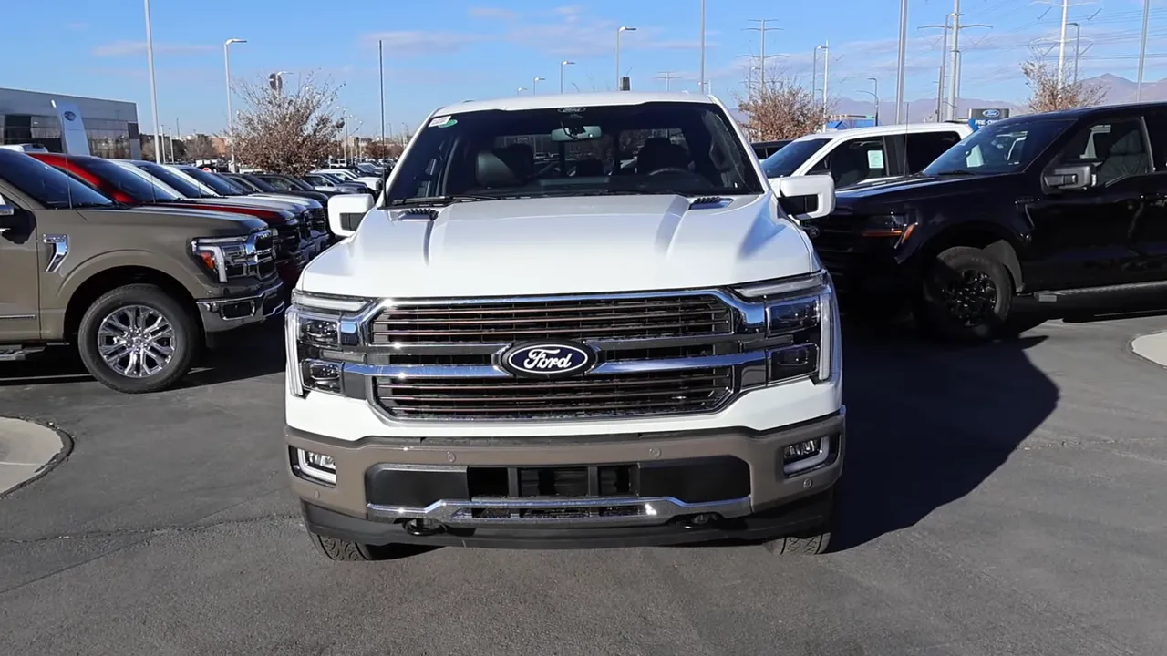 Full front view of 2026 Ford F-150 King Ranch showing two-tone bumper, grille and hood vents