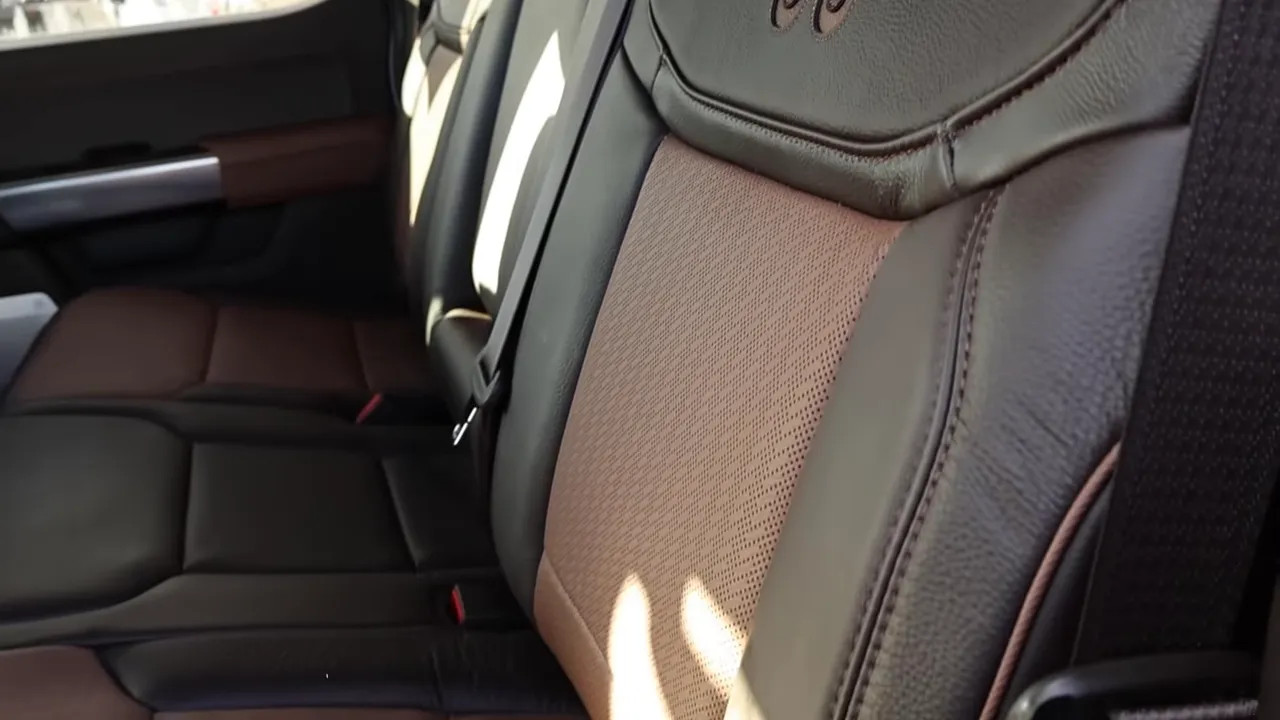 Rear seats with brown two-tone perforated leather in a 2026 Ford F-150 King Ranch