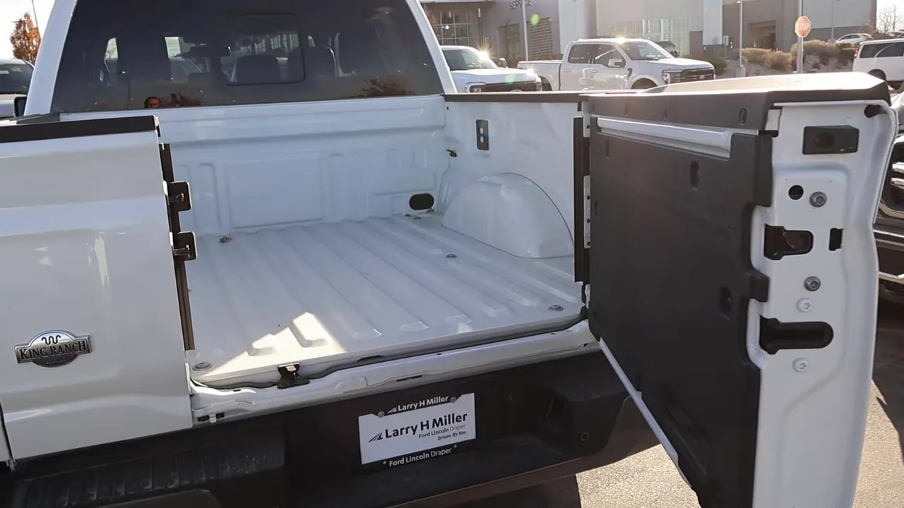 2026 F-150 King Ranch with barn-style tailgate open and empty painted bed