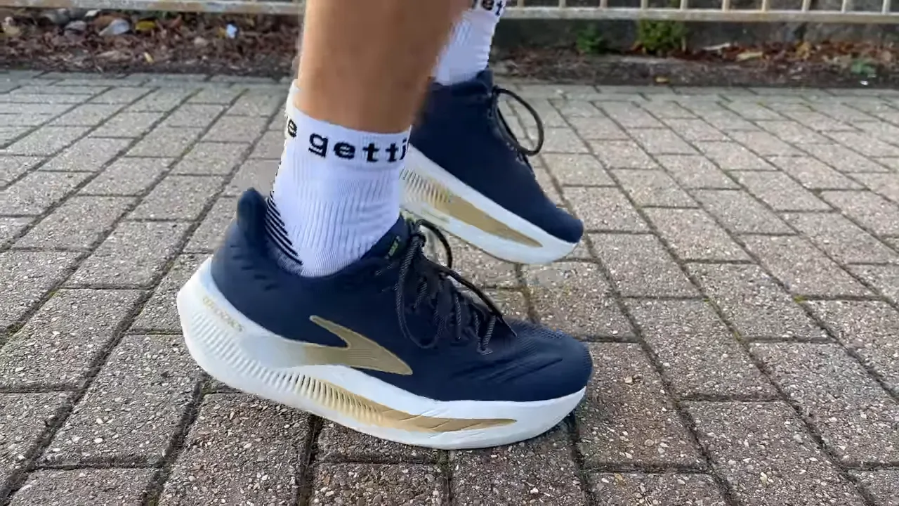 Side-on mid-stride close-up of Brooks Glycerin Max 2 showing midsole rocker and upper