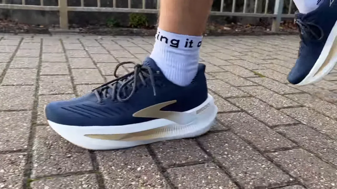 Brooks Glycerin Max 2 mid-stride toe-off on pavement showing rocker and midsole