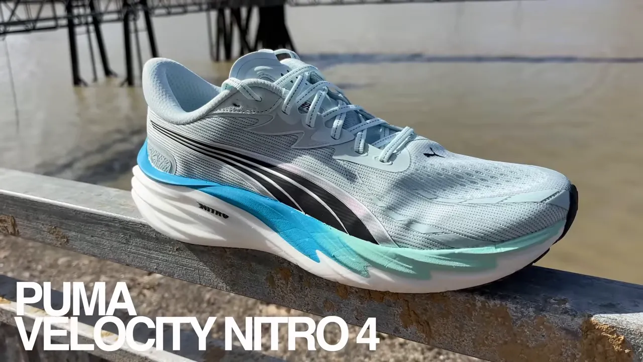 close up side view of Puma Velocity Nitro 4 showing midsole, upper and branding