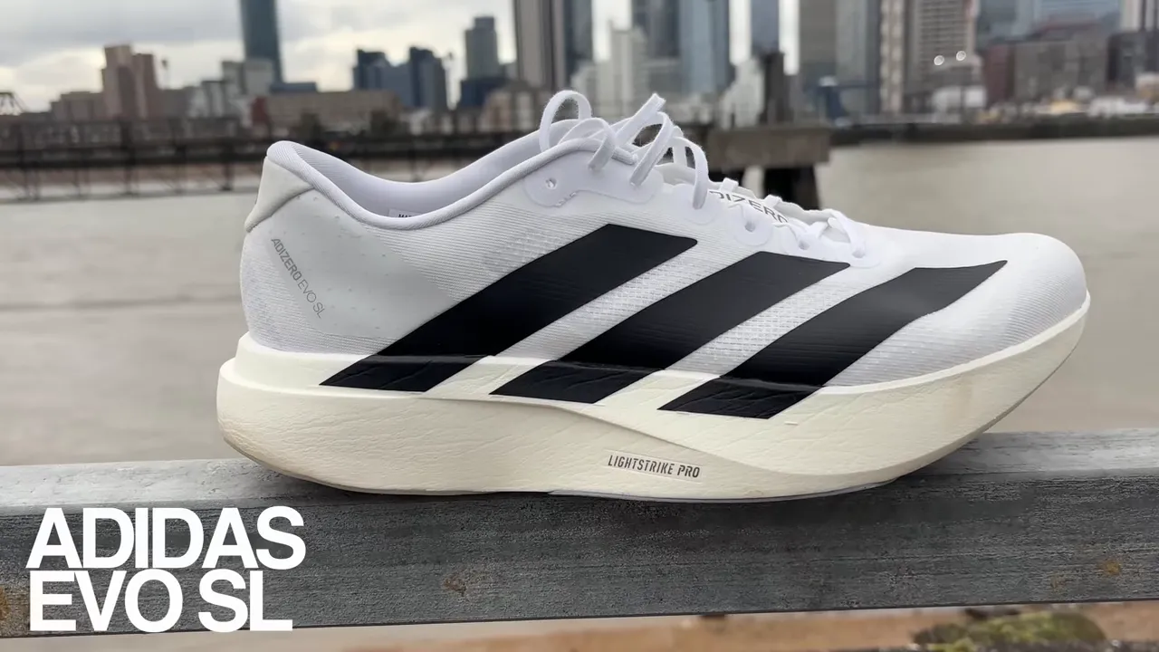 Adidas EVO SL side profile with Lightstrike Pro midsole and city skyline background