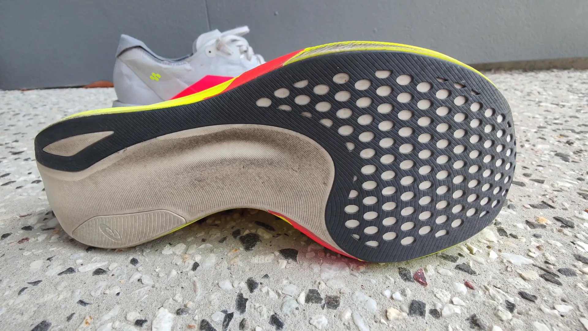 Outsole design comparison of Adizero Adios Pro 4 and Metaspeed Sky Edge Paris