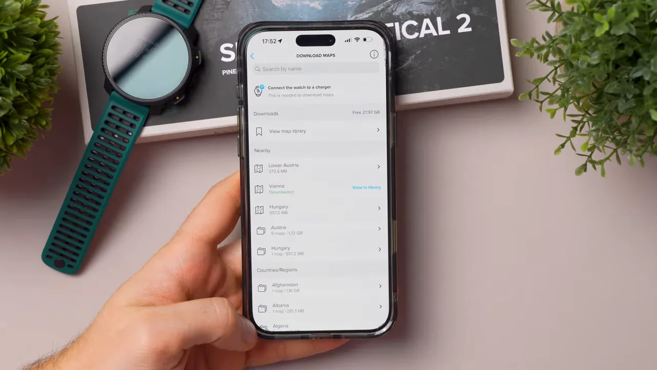 Clear view of Suunto app 'Download Maps' page listing regions (Vienna, Hungary, Austria) and free storage on a smartphone