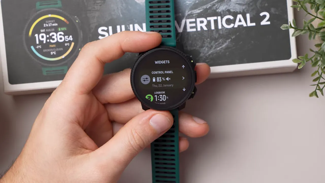 Suunto Vertical 2 displaying the Widgets screen with battery and logbook metrics