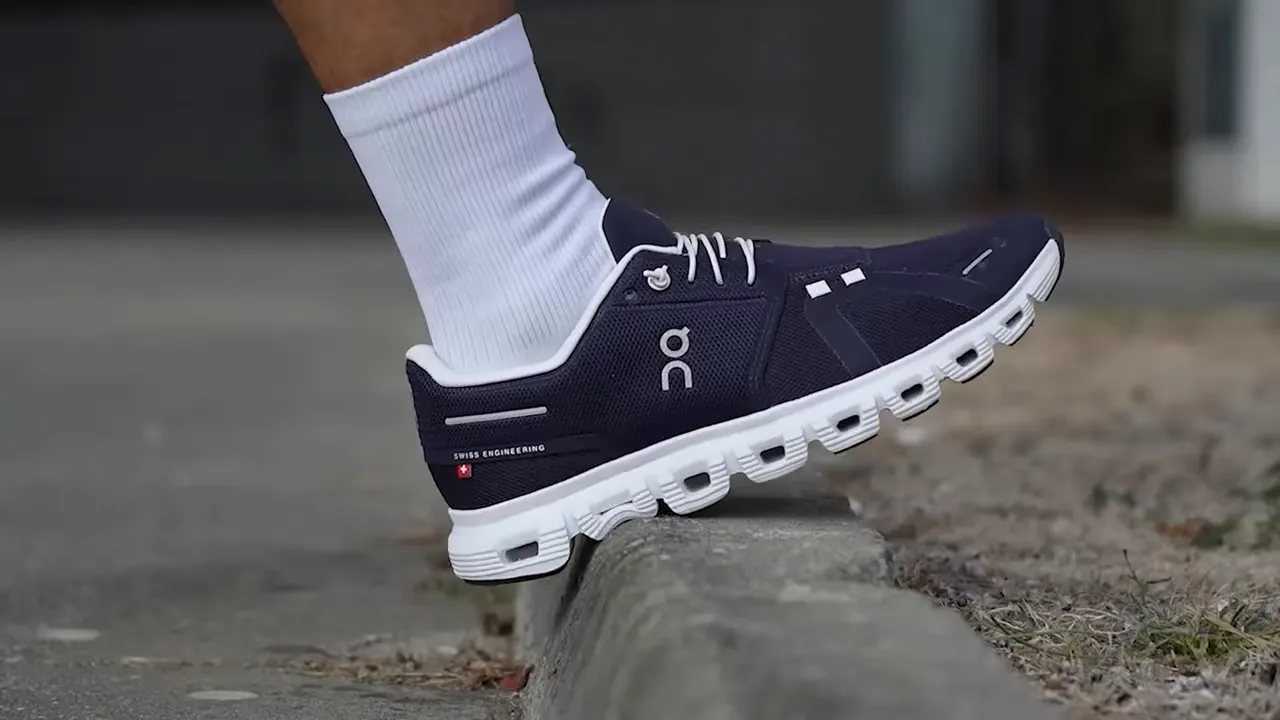 On Cloud 6 side profile on a curb showing CloudTec pod sole and upper