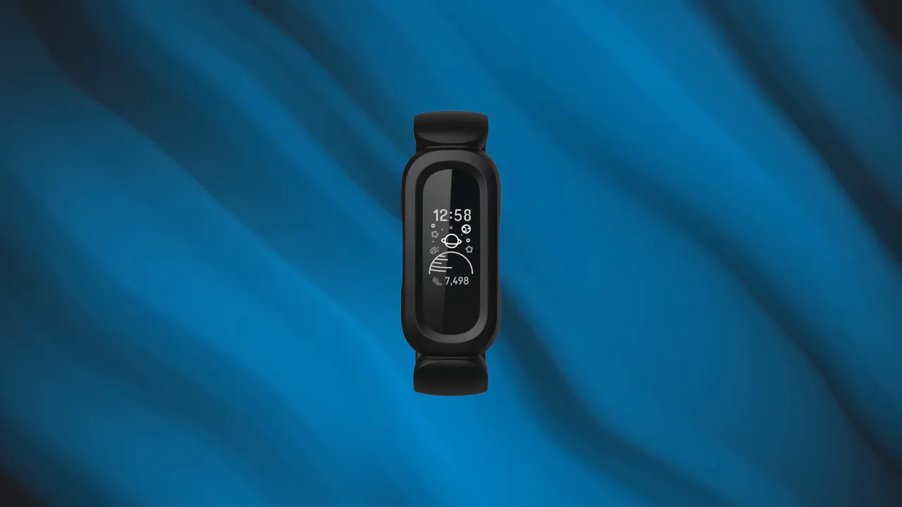 Kid-friendly fitness band front view showing time 12:58 and step count on a monochrome display