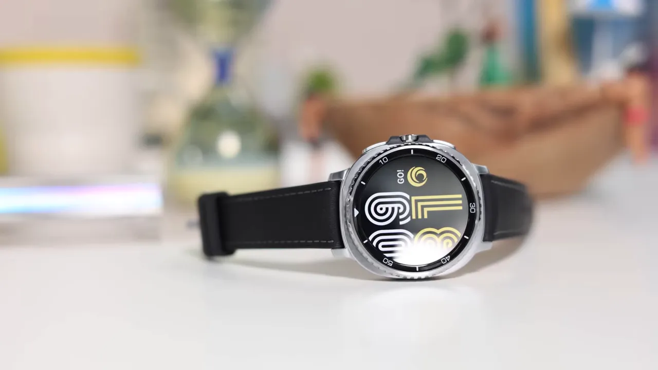 Samsung Galaxy Watch 8 Classic showing stainless steel case and rotating bezel on a white tabletop