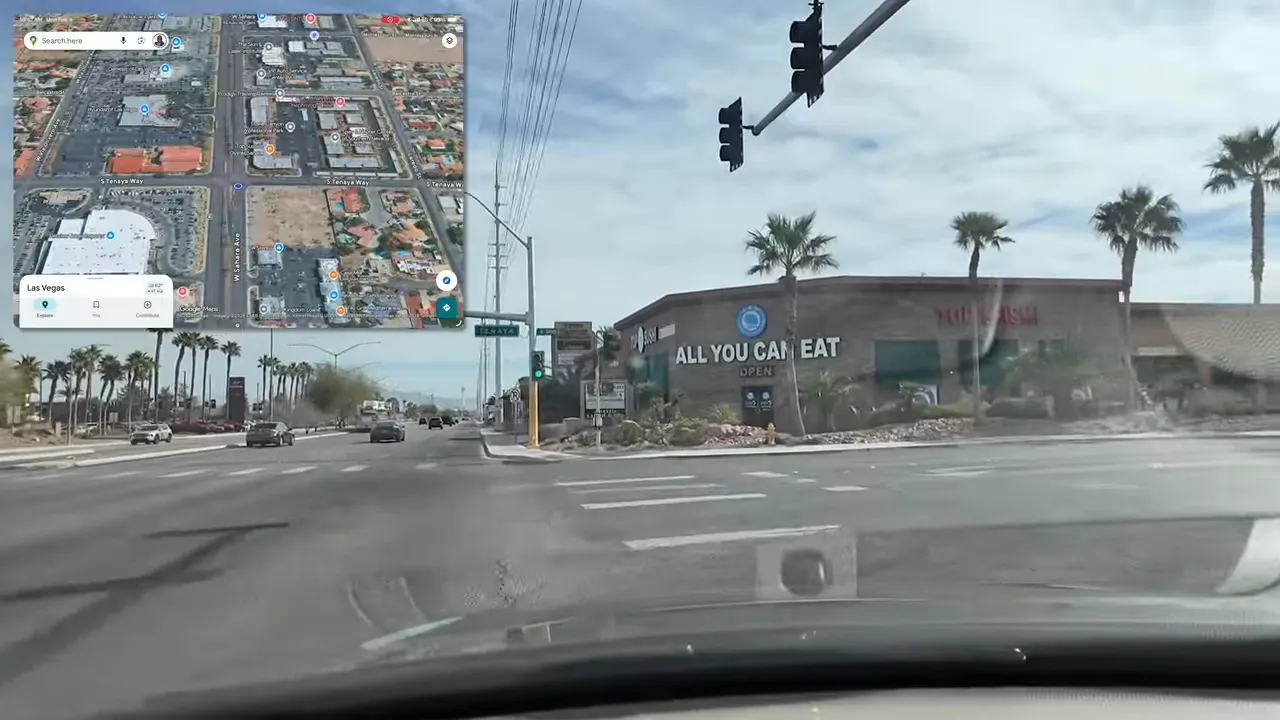 Road intersection view with commercial building signage near Section 10 in Las Vegas