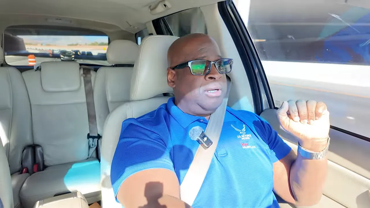 Real estate agent in a car explaining the importance of monthly payment affordability