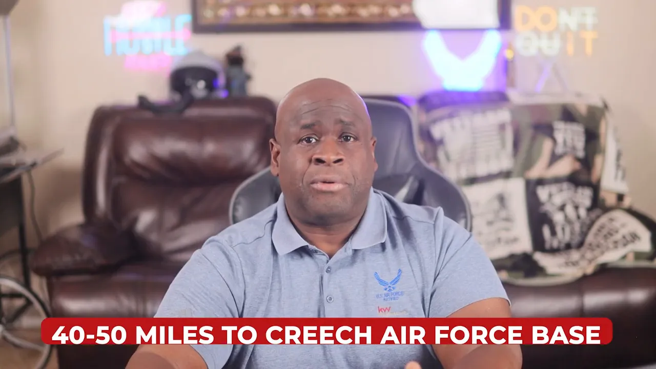 presenter with graphic banner reading '40-50 MILES TO CREECH AIR FORCE BASE' illustrating commute distance