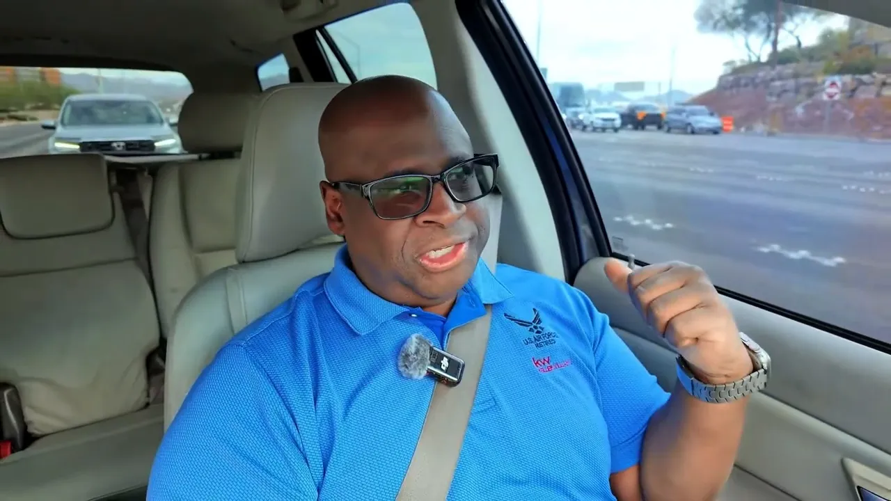 Veteran gesturing with his hand while speaking in a car, showing the friendly approach that earned a discount