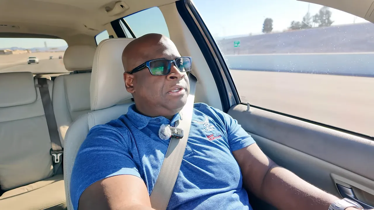 Host talking in car about a nearby listing and pricing mistakes