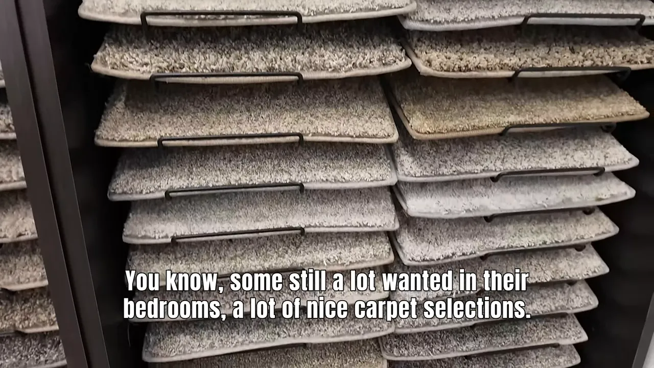 Gray and beige carpet samples with visible texture variations on display
